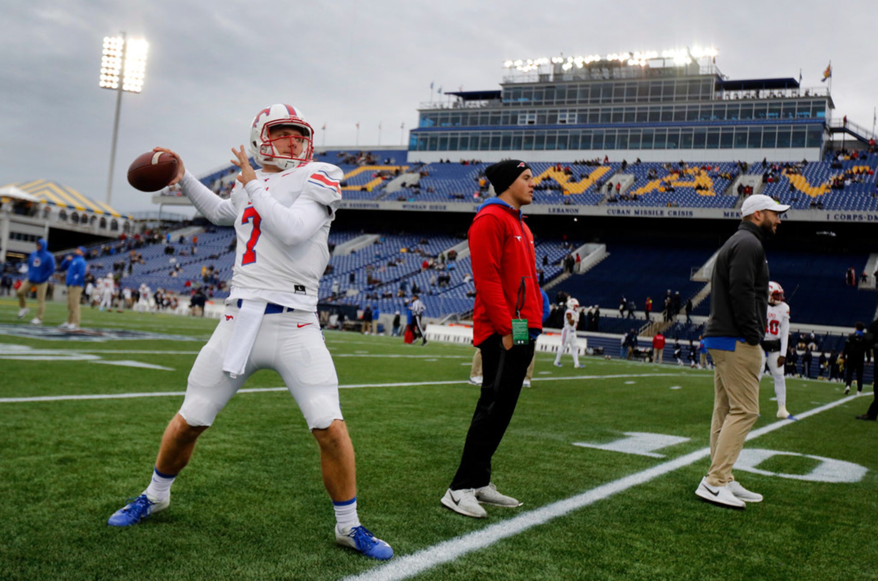 1Southern Methodist Mustangs quarterback Shane Buechele (7) throws passes during pregame...