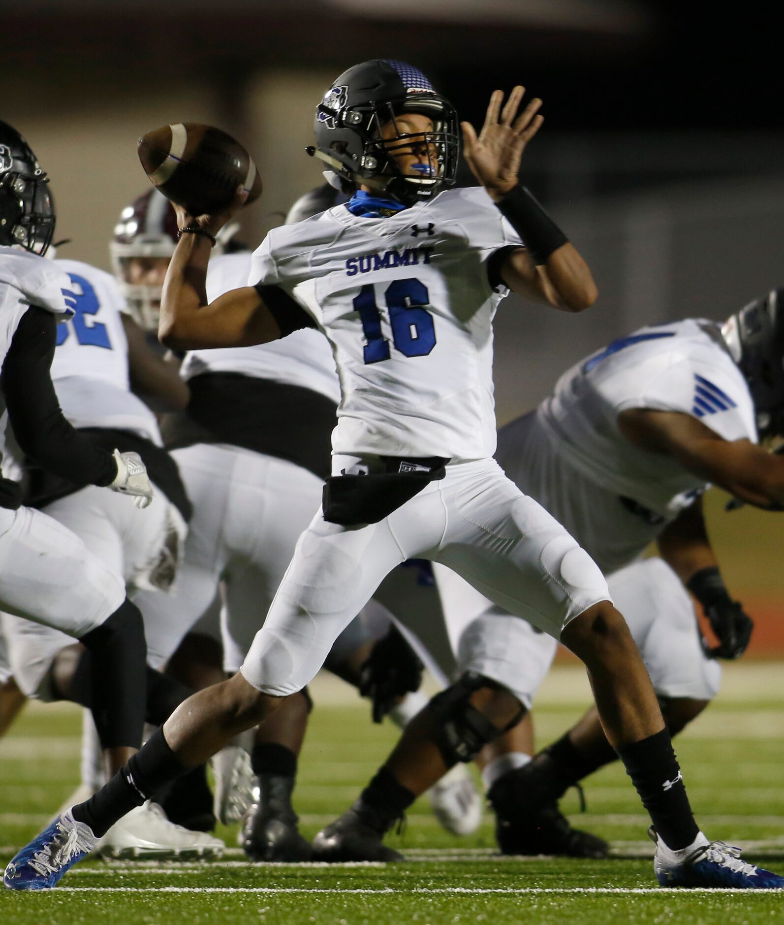 Mansfield Summit quarterback Emaceo Davis (16) launches a pass downfield during first...