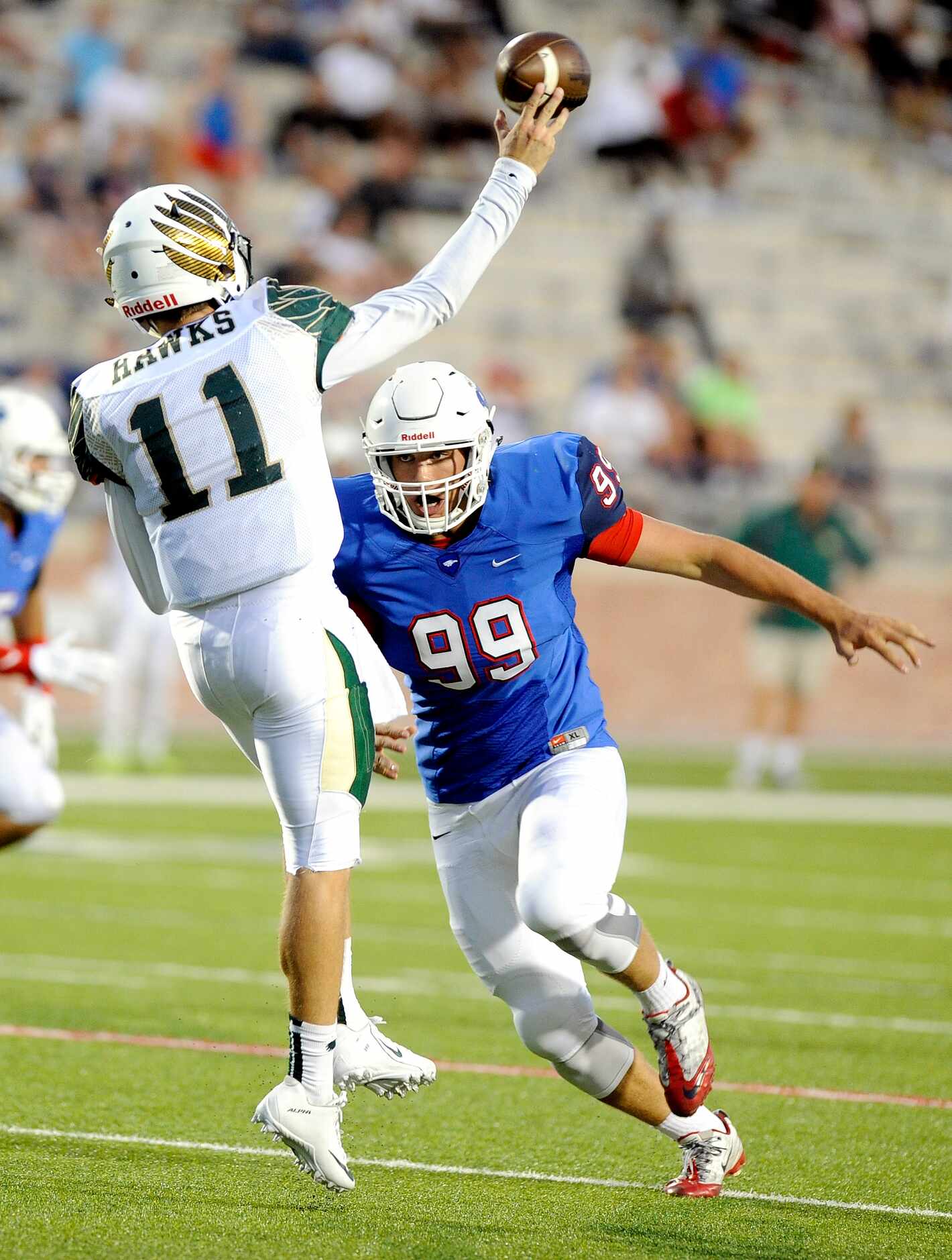 Allen's Cole Maxwell (99) pressure Viera quarterback Hayden Kingston on a pass in the first...