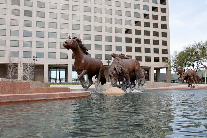Williams Square, anchored by the Mustangs of Las Colinas sculpture by Robert Glen, is an...