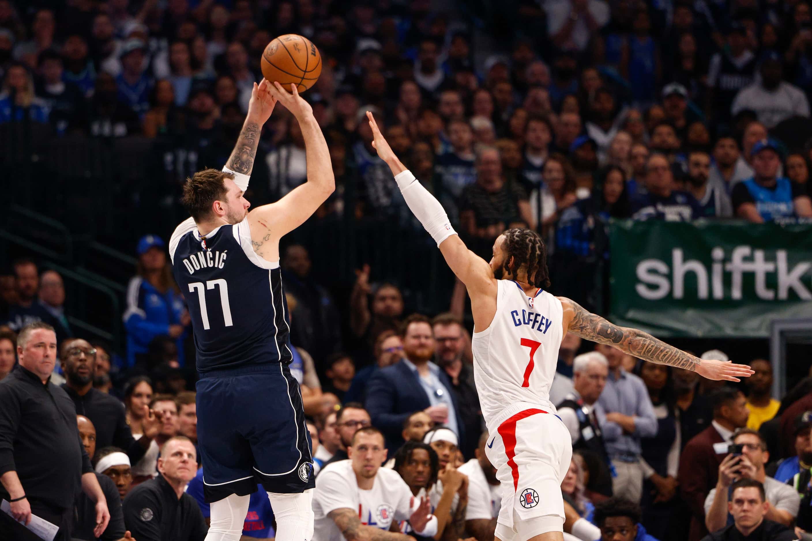 Dallas Mavericks guard Luka Doncic (77) shoots over LA Clippers guard Amir Coffey (7) during...