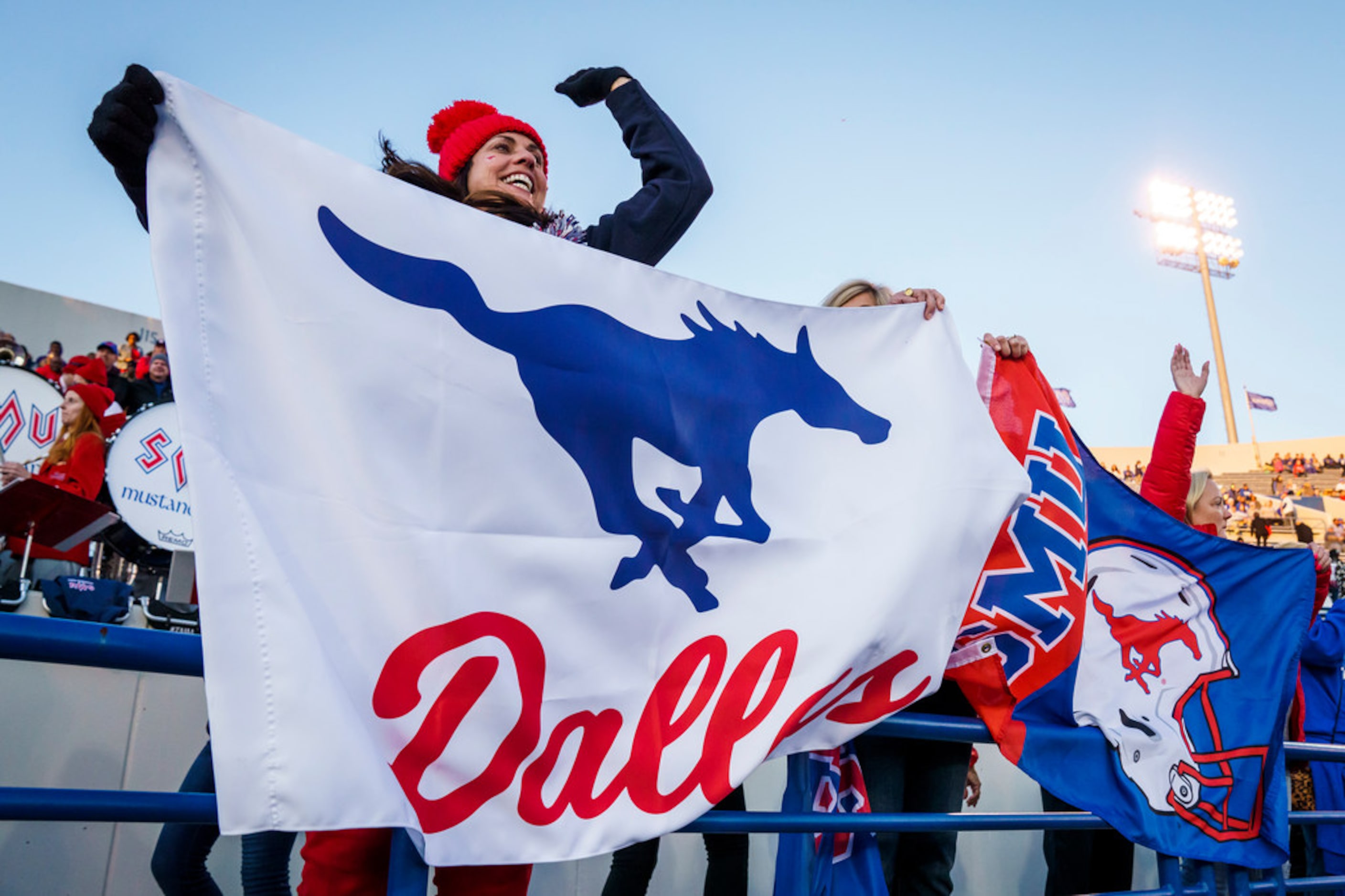 Kristen Redding, mother of SMU tight end Ben Redding, cheers as the Mustangs take the field...