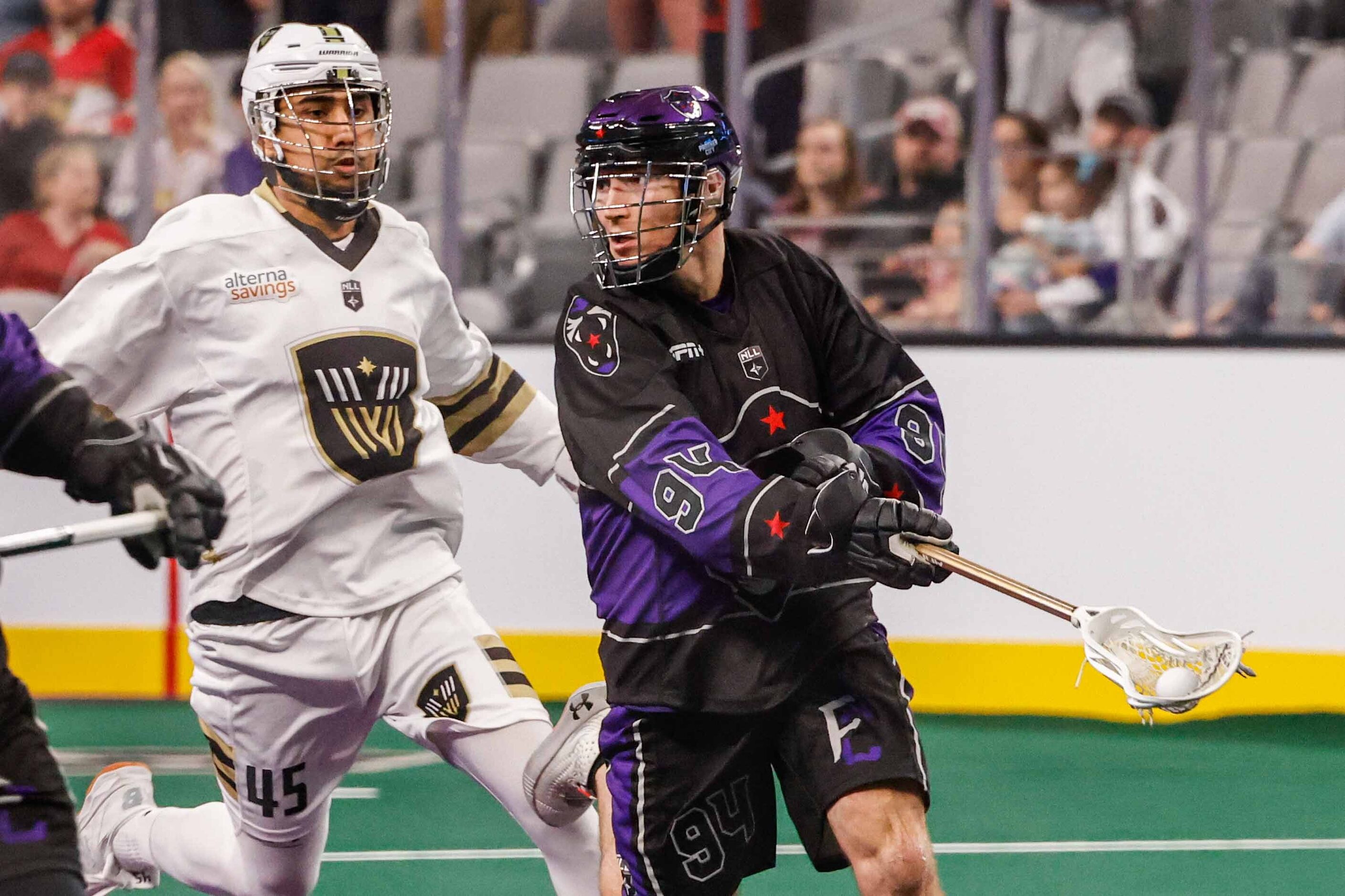 Panther City Matt Hossack (94) tries to make a pass through Vancouver Warriors Keegan Bal...