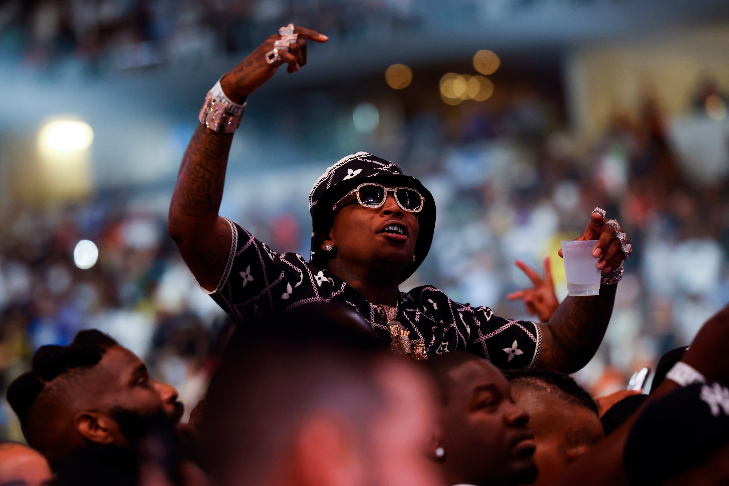 Fans cheer as DeSoto’s Errol Spence Jr. walks to the ring before a welterweight championship...