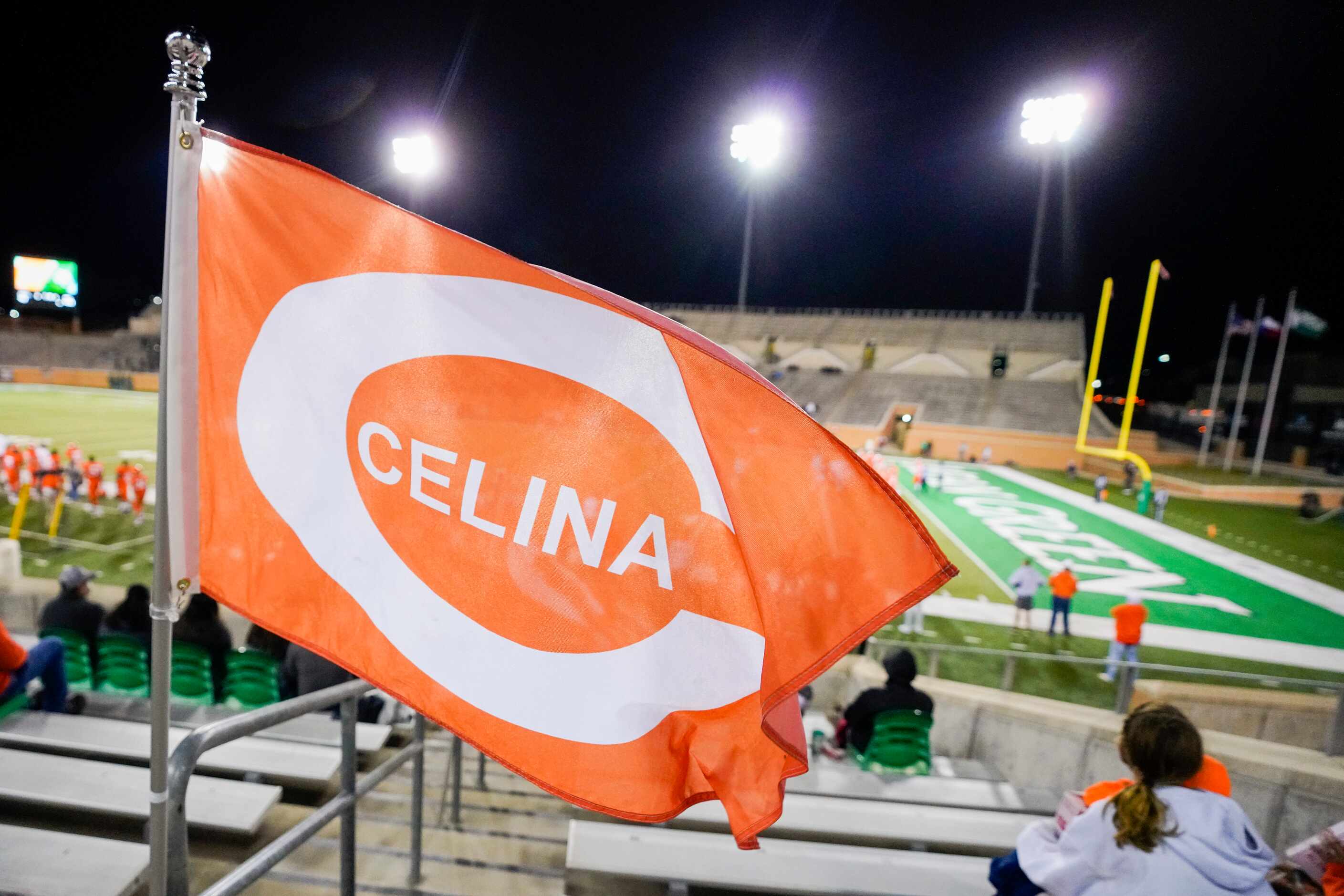 Celina flags fly in the stands during the second half of a 42-24 victory over Iowa Park in a...