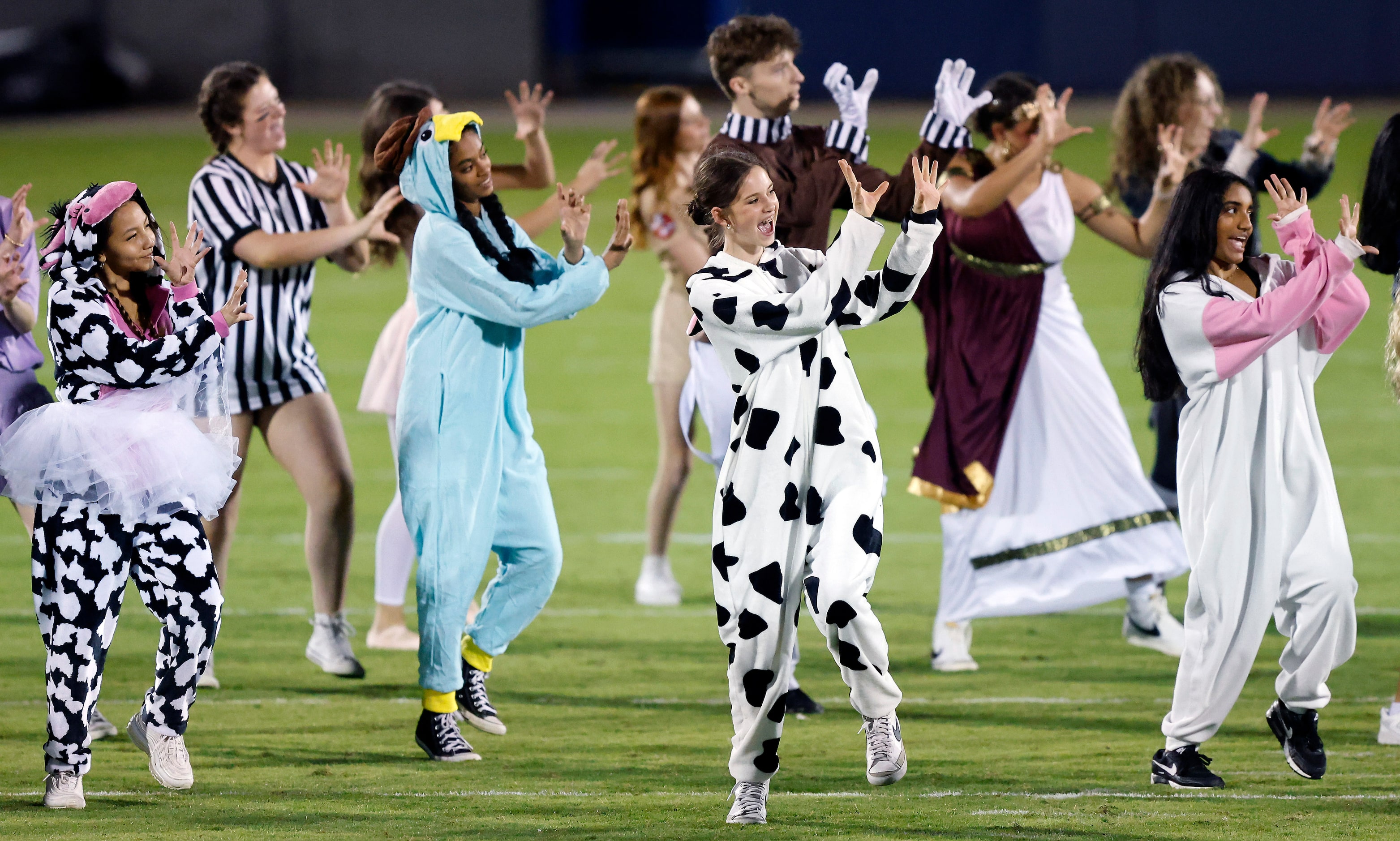 Dressed for Halloween, the Frisco Independence Royals Drill Team performs Michael Jackson’s...