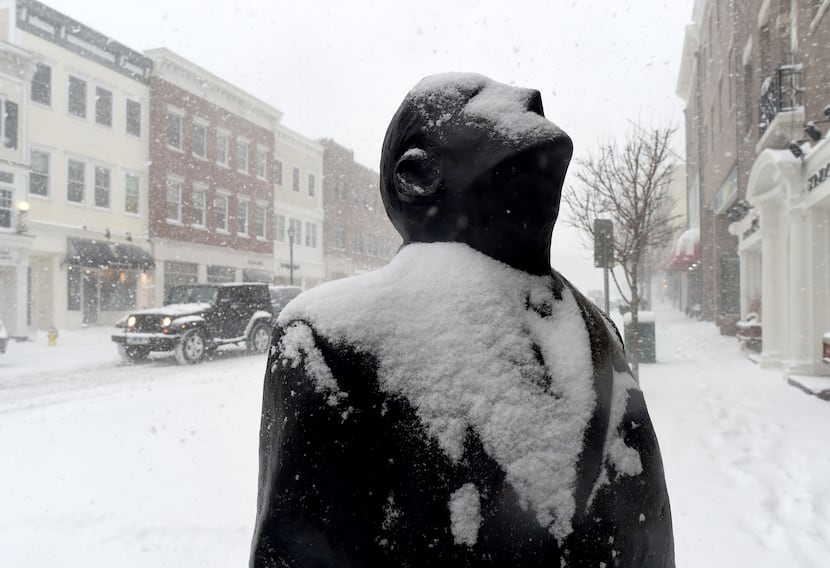  A snow covered sculpture is seen in Greenwich, Connecticut January 23, 2016. (TIMOTHY A....