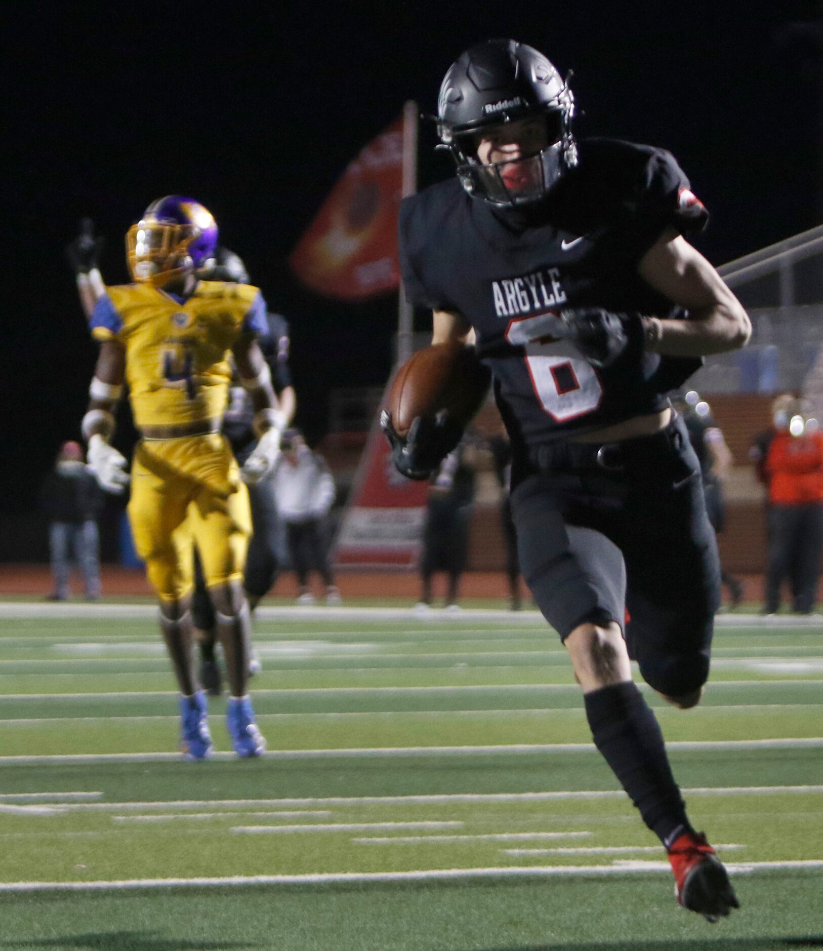 Argyle receiver Hayden Stewart (6) rambles into the end zone for a first quarter receiving...