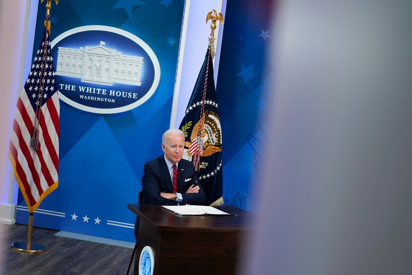 President Joe Biden listens during a virtual meeting with Democratic governors on the issue...