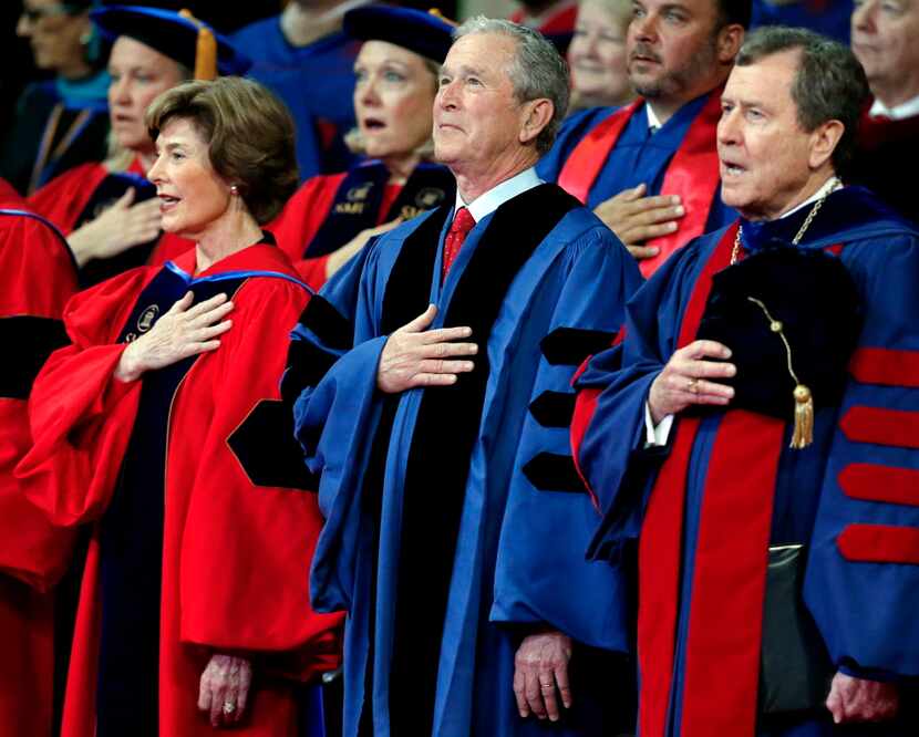 (From left) Former first lady Laura Bush, President George W. Bush and R. Gerald Turner,...