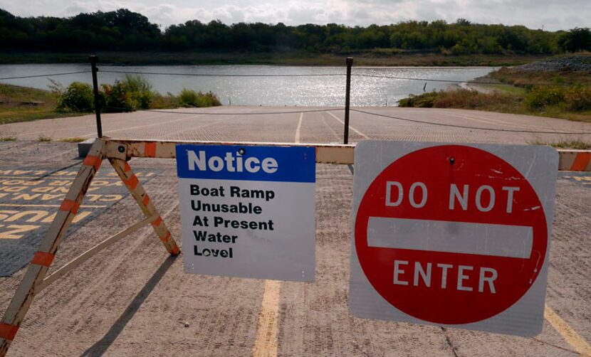 Boat ramps at East Fork Park on Lavon Lake were barricaded in October 2014, when the lake...