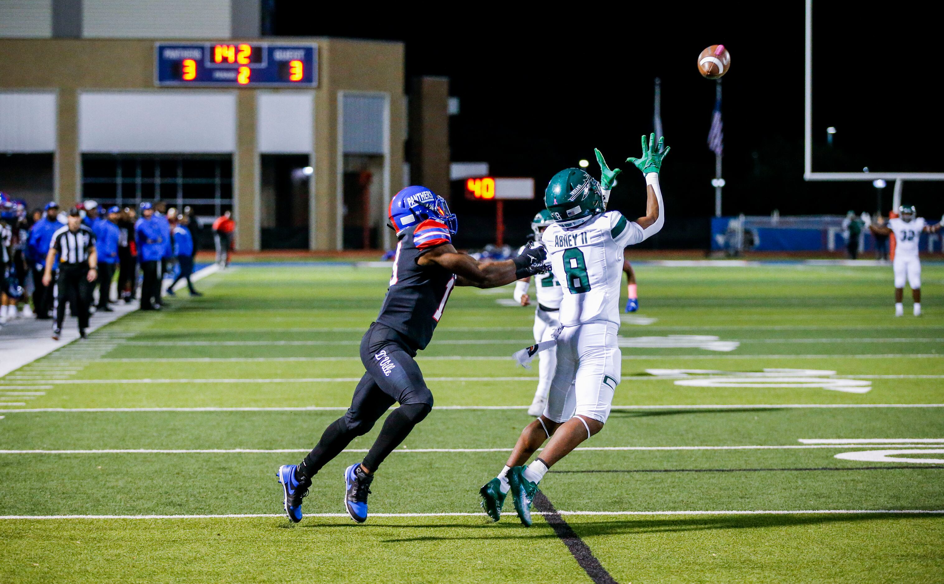 Waxahachie junior defensive back Keith Abney II (8) intercepts a pass intended for...