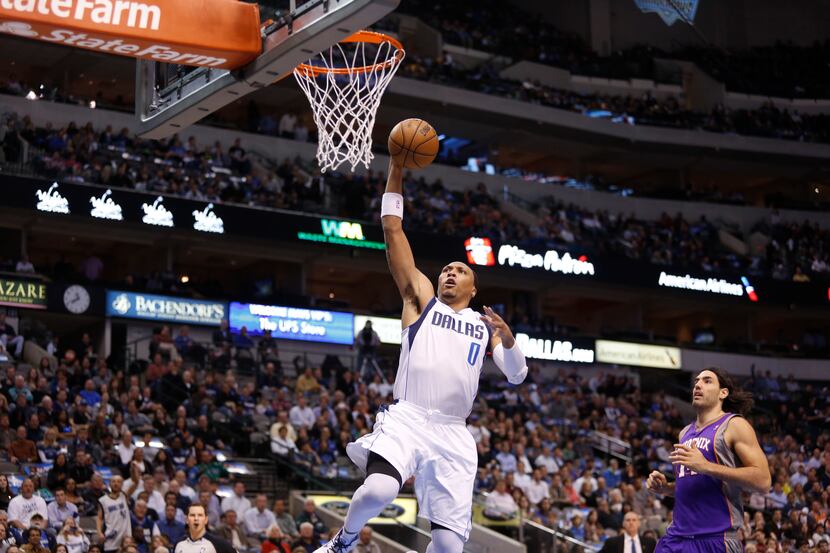 Shawn Marion (0) of the Dallas Mavericks takes a shot during a NBA basketball game against...