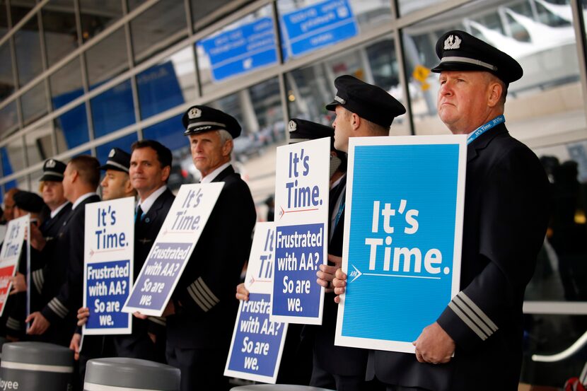 American Airlines first officer Ken Abernathy (right) joined pilots representing the Allied...