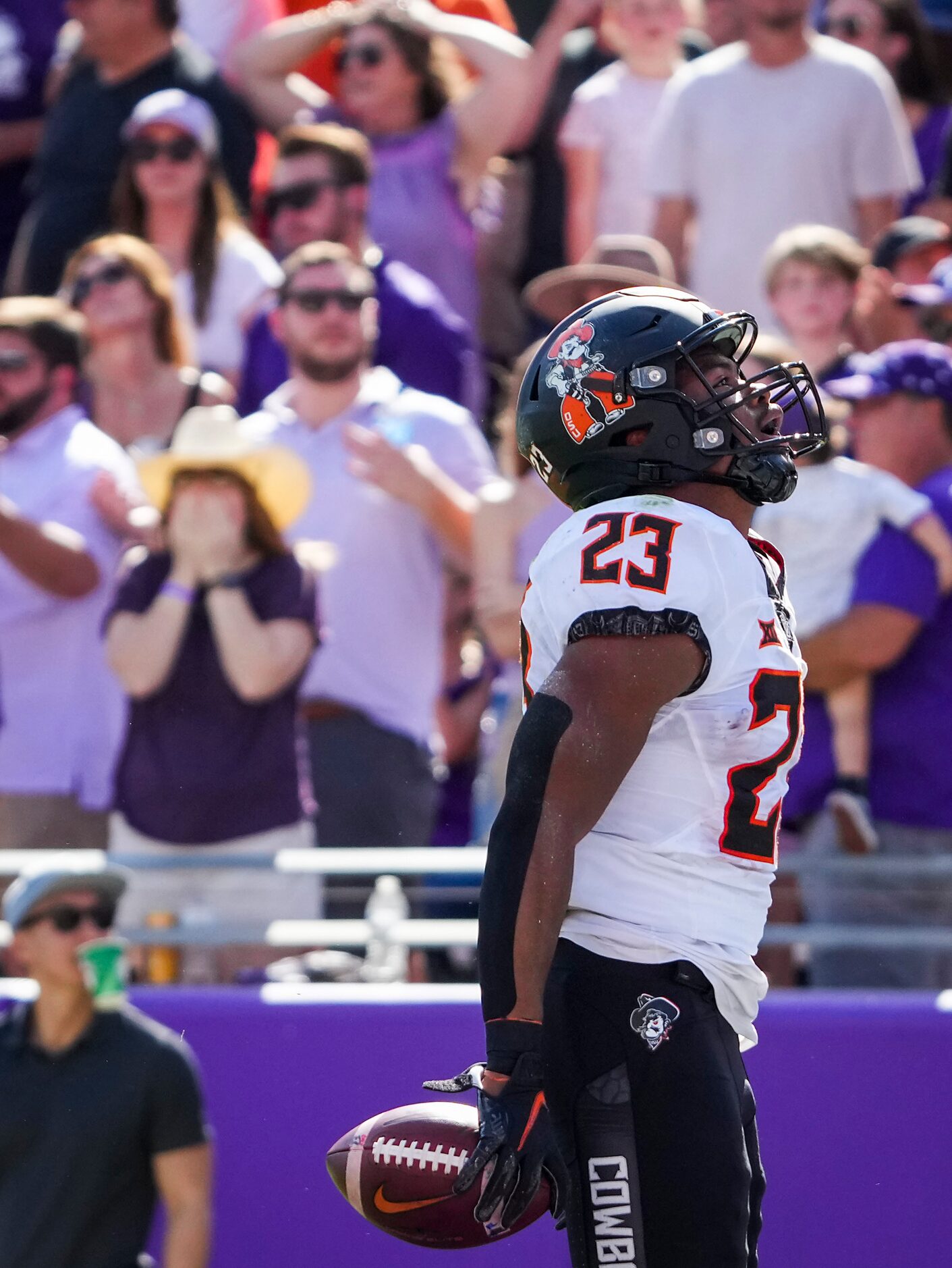 Oklahoma State cornerback Cameron Epps (23) celebrates after recovering a punt that was...