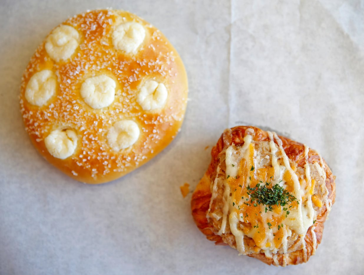 Sugared cream cheese brioche (left) and Tuna danish 85C Bakery Cafe in Carrollton, Texas,...