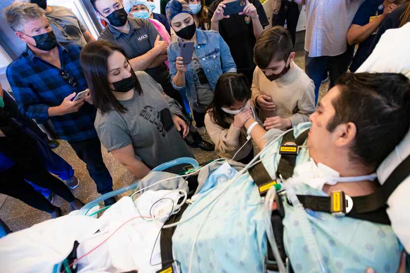 Hugo Miranda greets his daughter, Sophia, and son, Santiago, as he is released from...