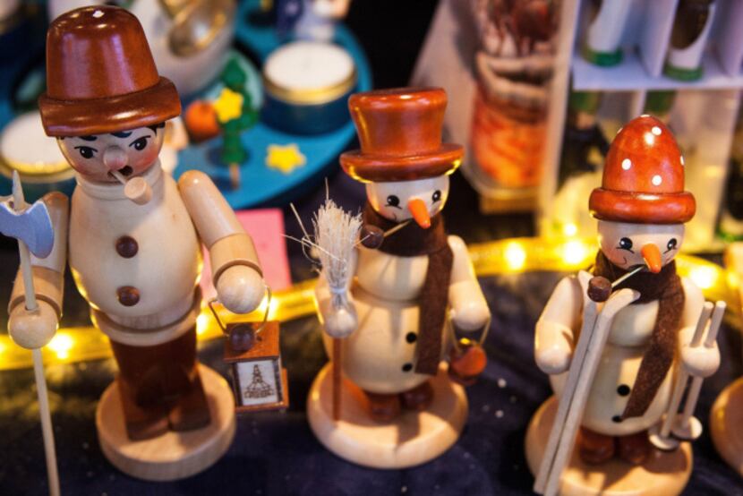 Tradtional wood toy figures are sold at the Alexanderplatz Christmas Market in Berlin, Germany.