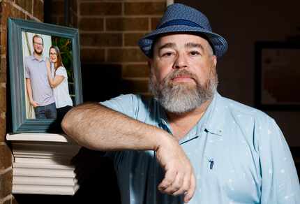 Allen Whitelock poses for a portrait with a photograph of her daughter Alli Burscough and...