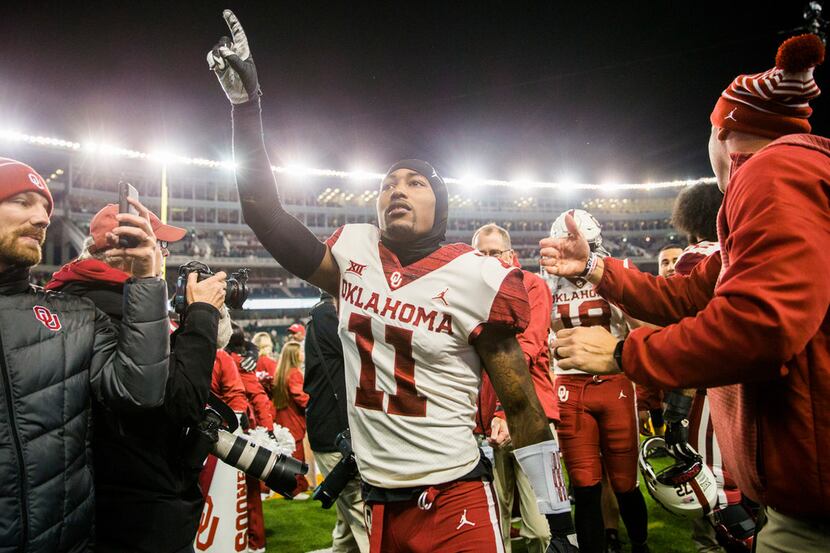 Oklahoma Sooners cornerback Parnell Motley (11) celebrates after a 34-31 win against the...