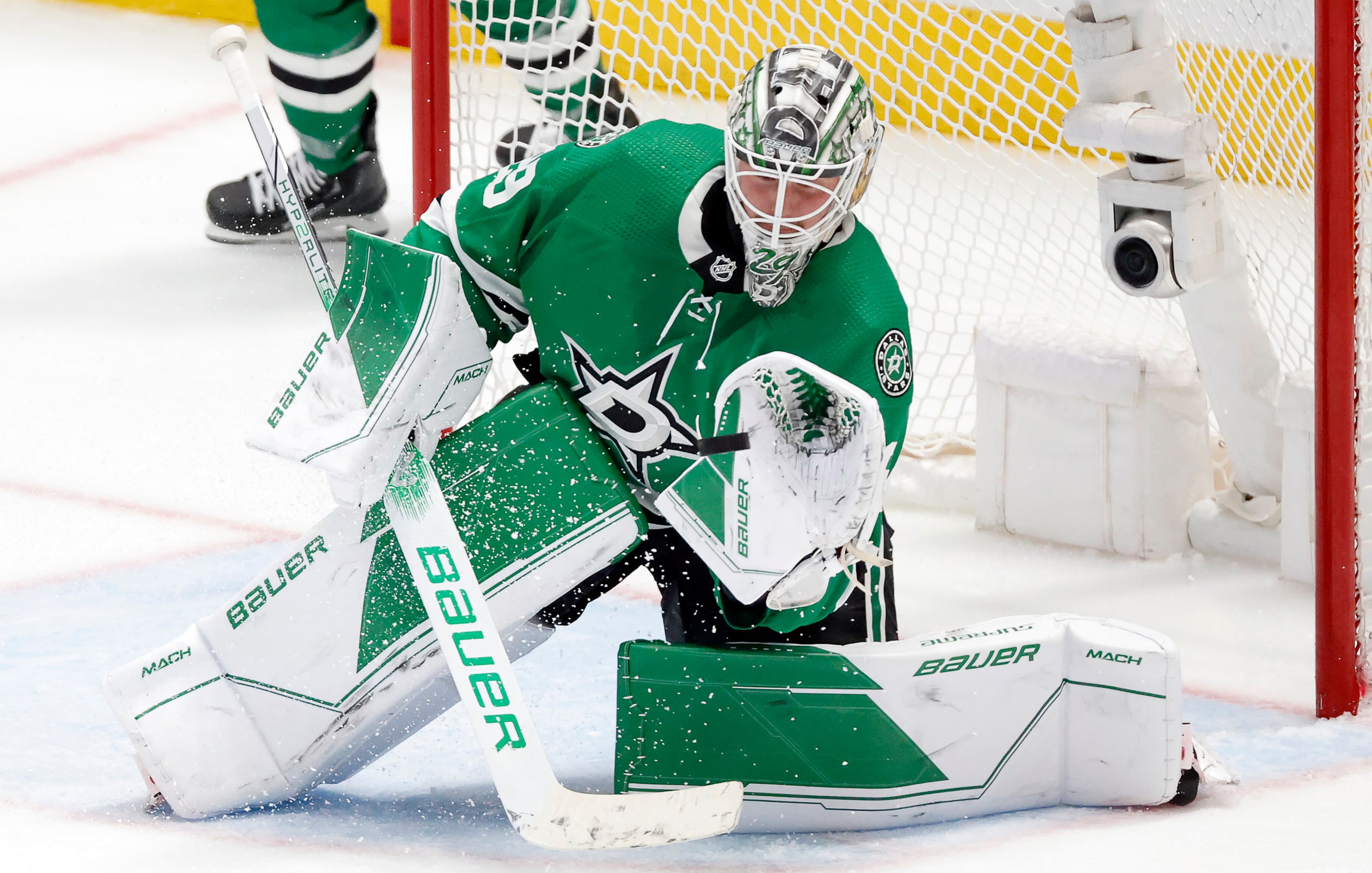 Dallas Stars goaltender Jake Oettinger (29) snares a Seattle Kraken shot during overtime of...