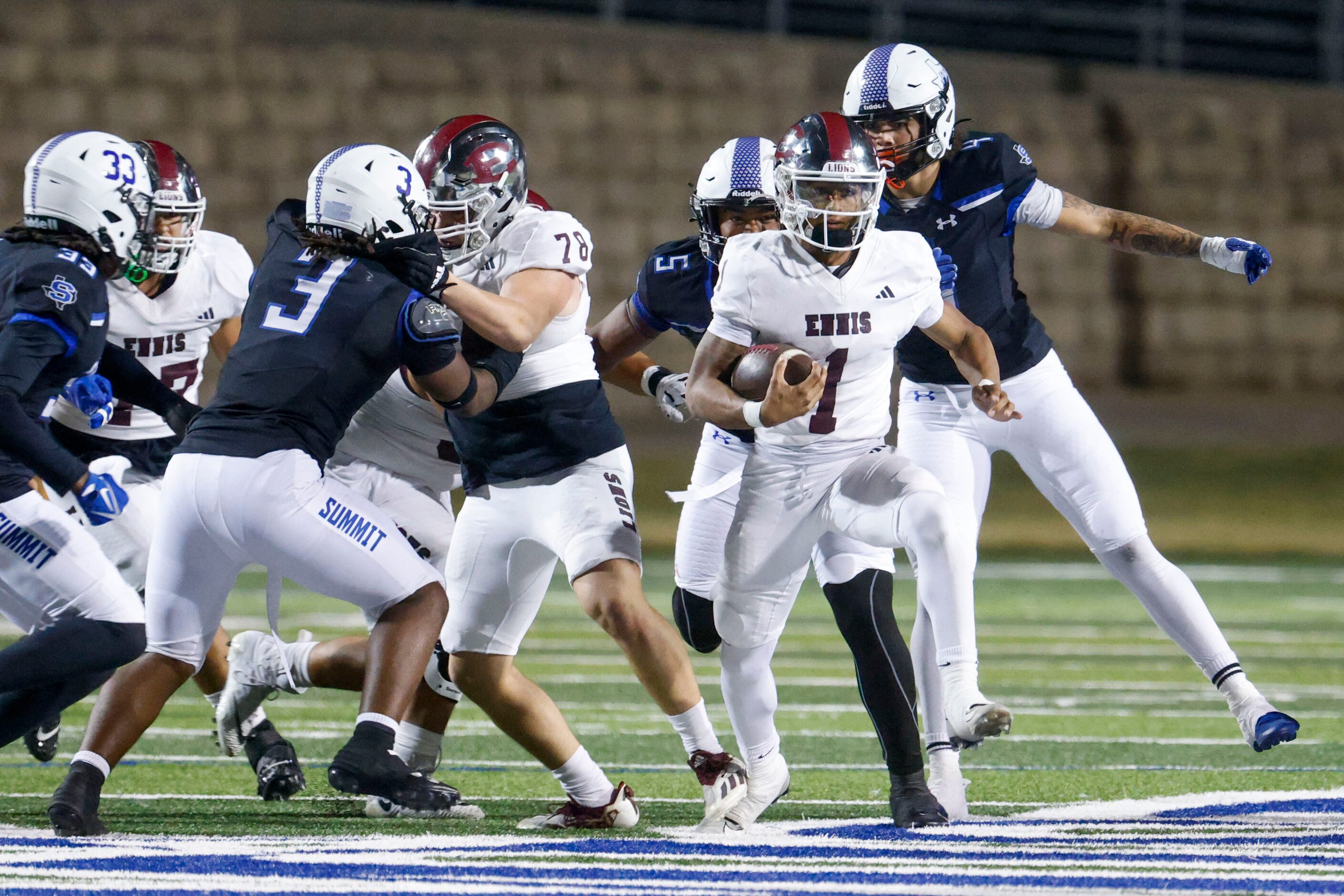 Ennis High’s Gracen  Harris (1) runs out of the defense line against Mansfield Summit High...