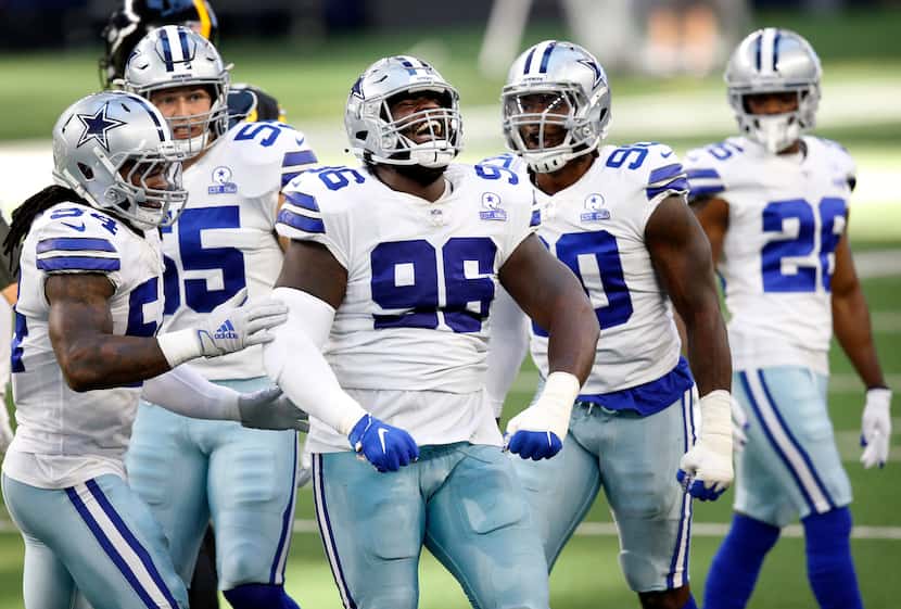 Cowboys defensive tackle Neville Gallimore (96) celebrates his stop of Steelers running back...