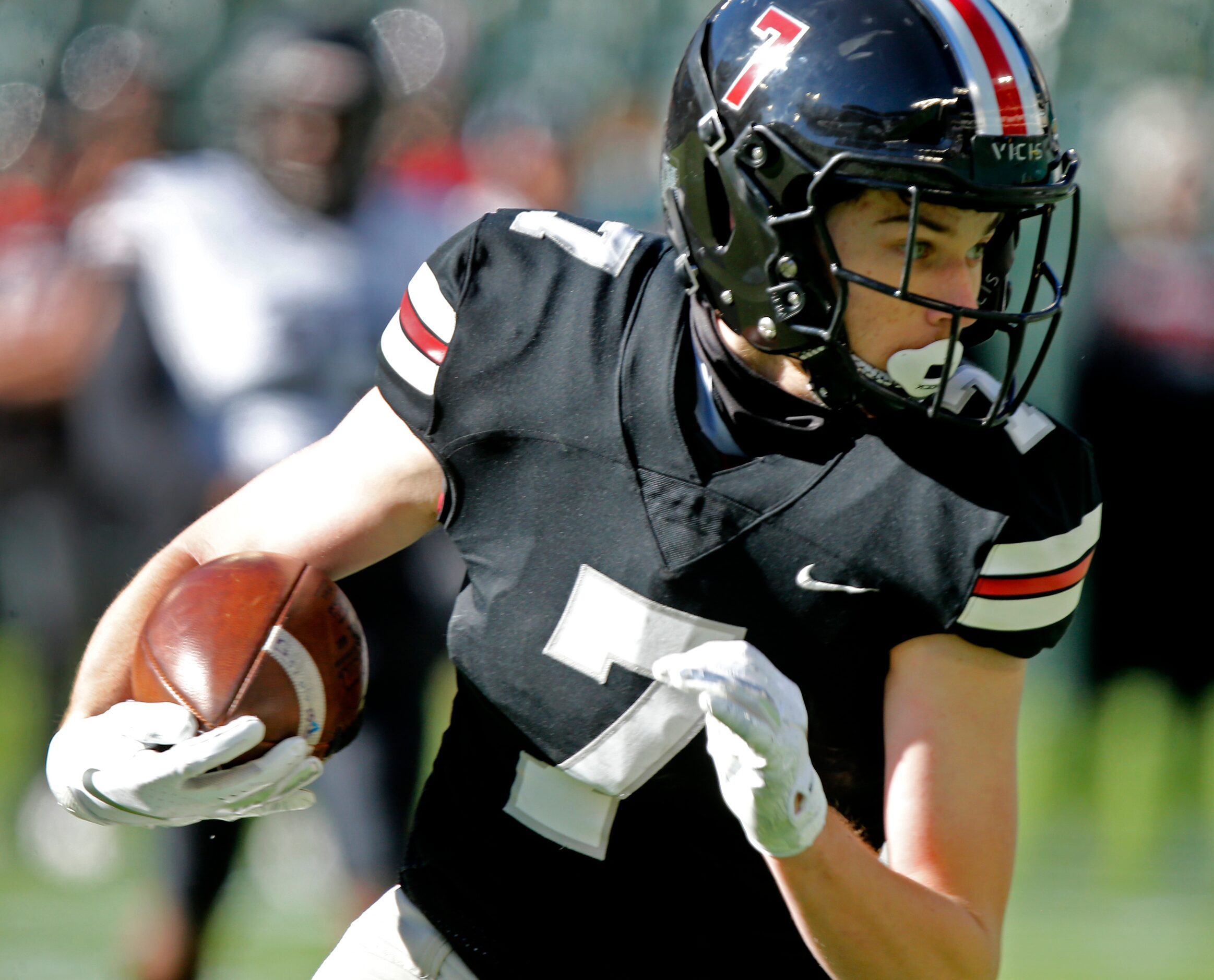 Lovejoy High School wide receiver Reid Westervelt (7) runs for a touchdown after the catch...