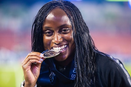 Chioma Ubogagu poses with a winners medal from the 2019 SheBelieves Cup.