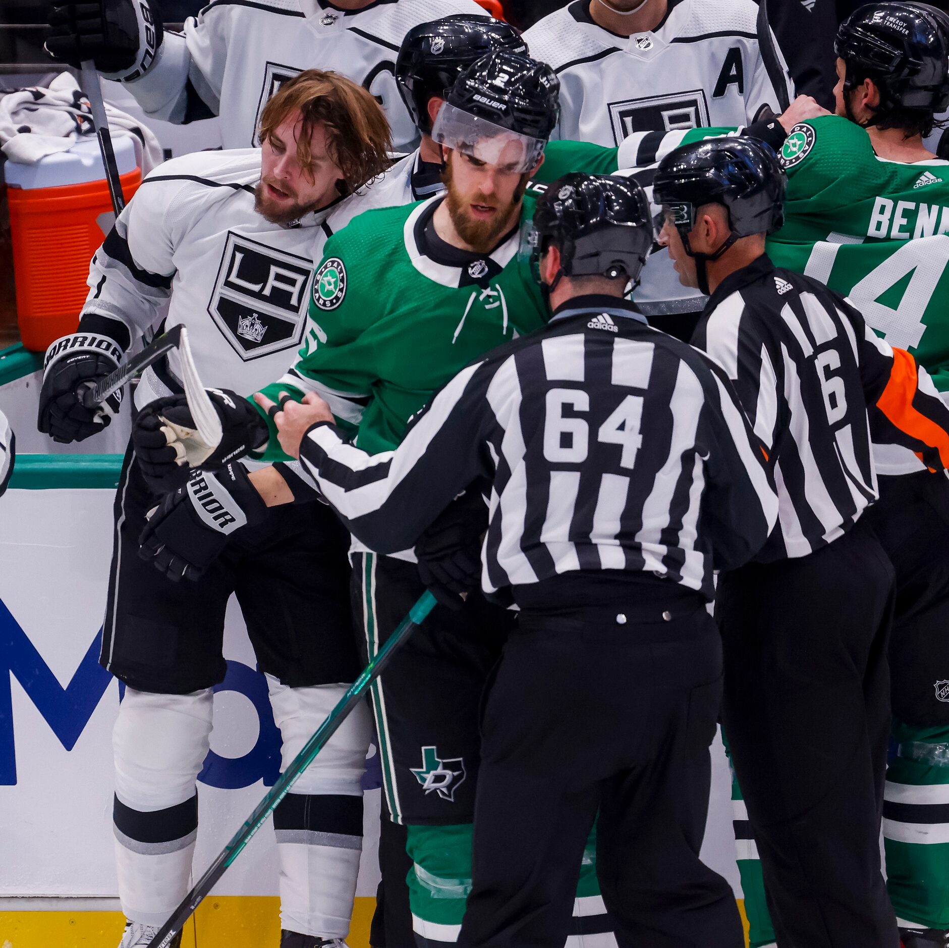 Dallas Stars defenseman Jani Hakanpaa (2) is pulled from Los Angeles Kings right wing Adrian...