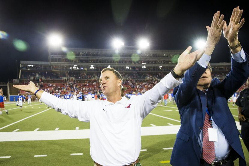 SMU head coach Chad Morris thanks the home fans after the Mustangs 31-13 victory over North...