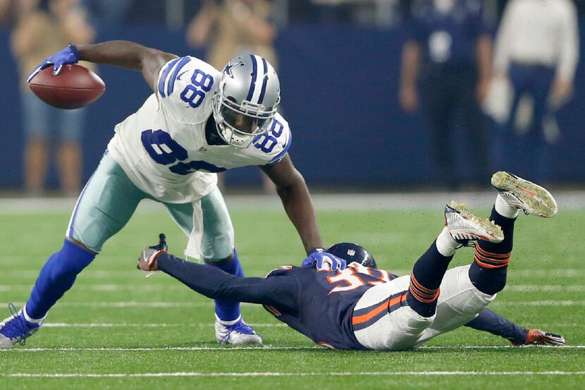 Dallas Cowboys wide receiver Dez Bryant (88) breaks away from Chicago Bears cornerback...