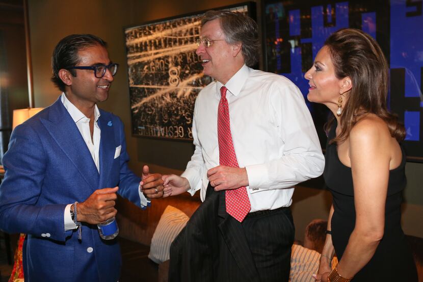 (L to R) Ed Shaikh, Mark Knowles, and Melinda Knowles at Fashion's Night Out at Highland...
