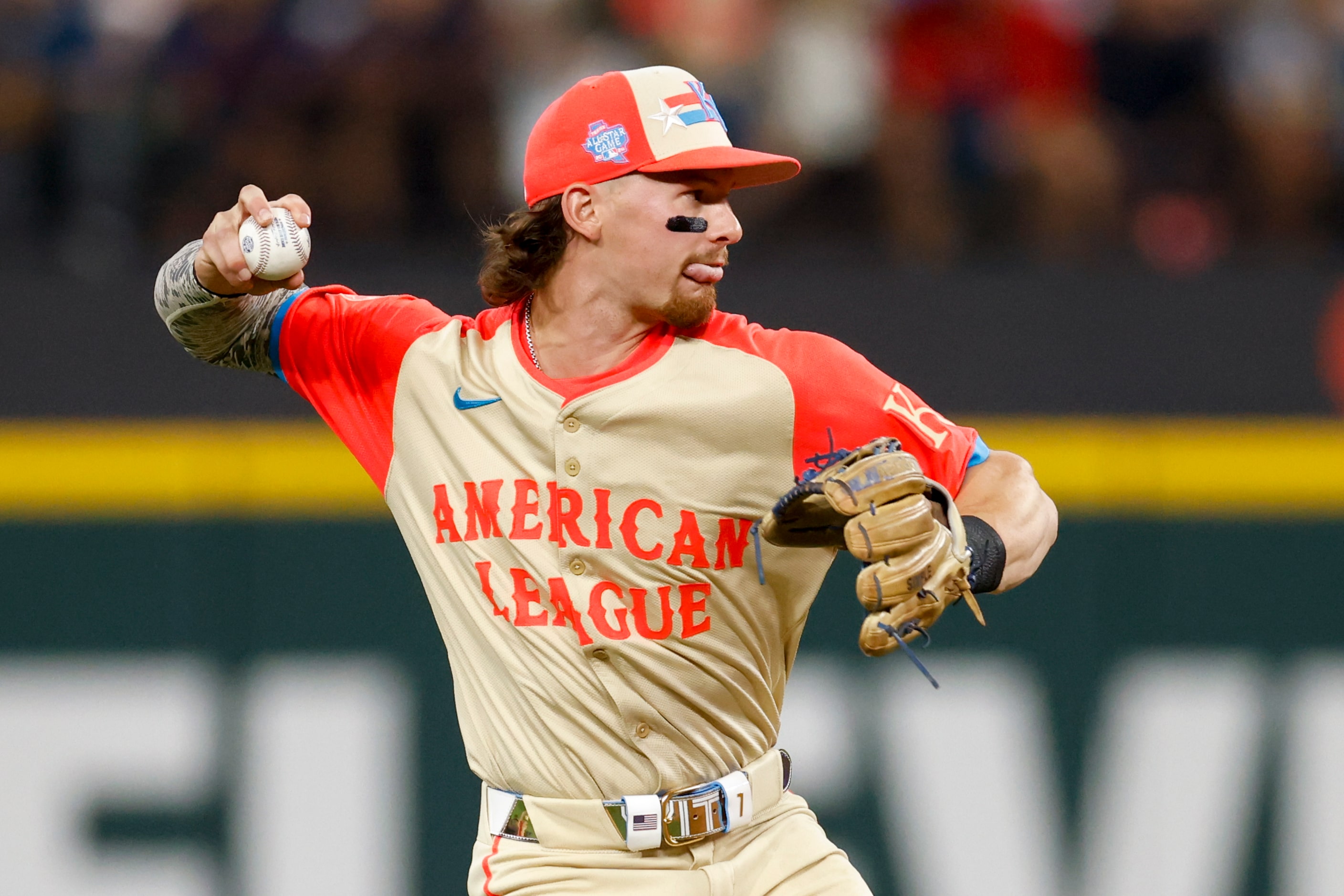 American League's Bobby Witt Jr., of the Kansas City Royals, throws to first after fielding...