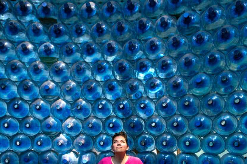 Leslie Moody Castro, who splits her time between Texas and Mexico, poses in a structure made...