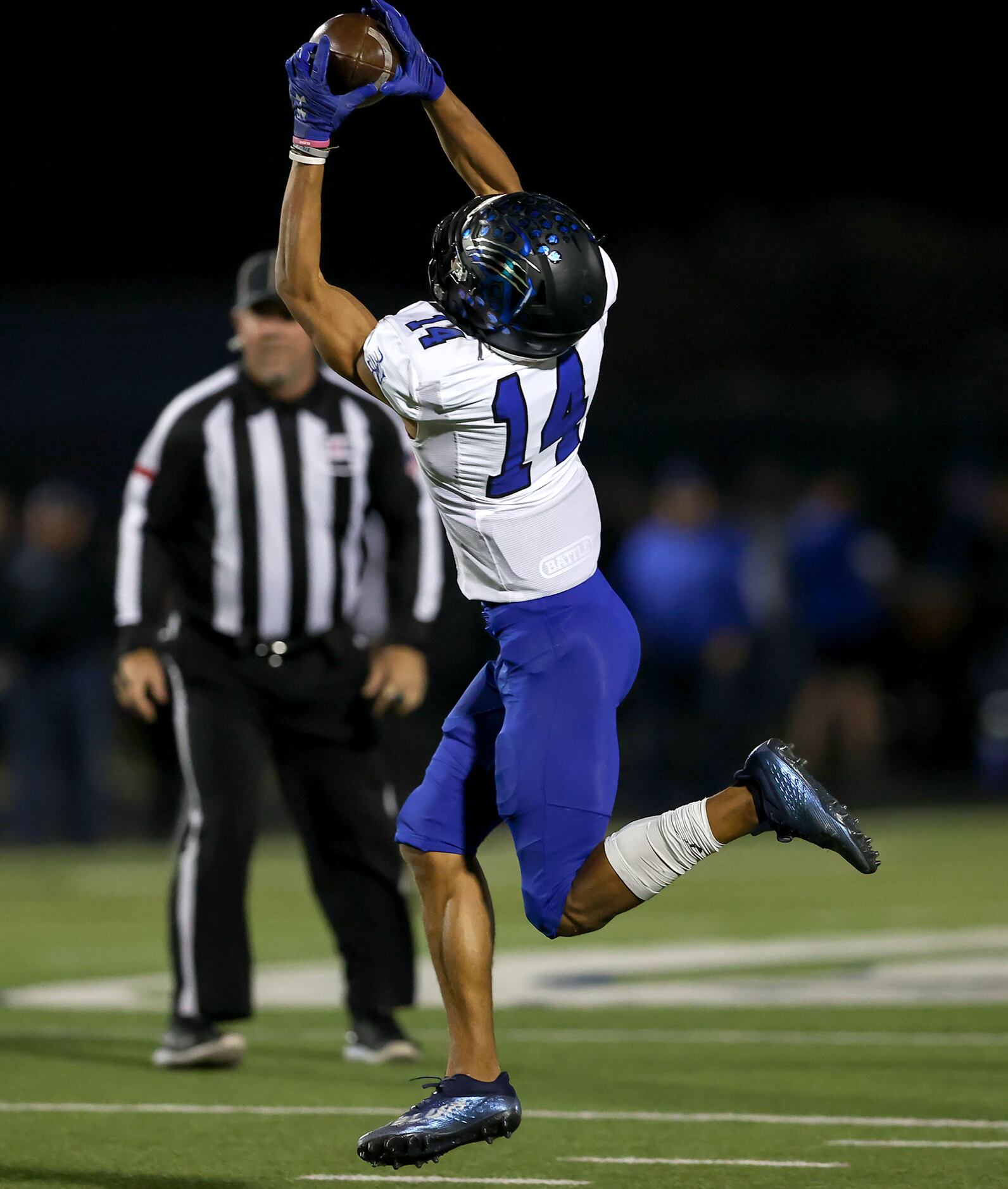 Byron Nelson wide receiver Landon Ransom-Goelz goes up to grab the ball and goes 45 yards...