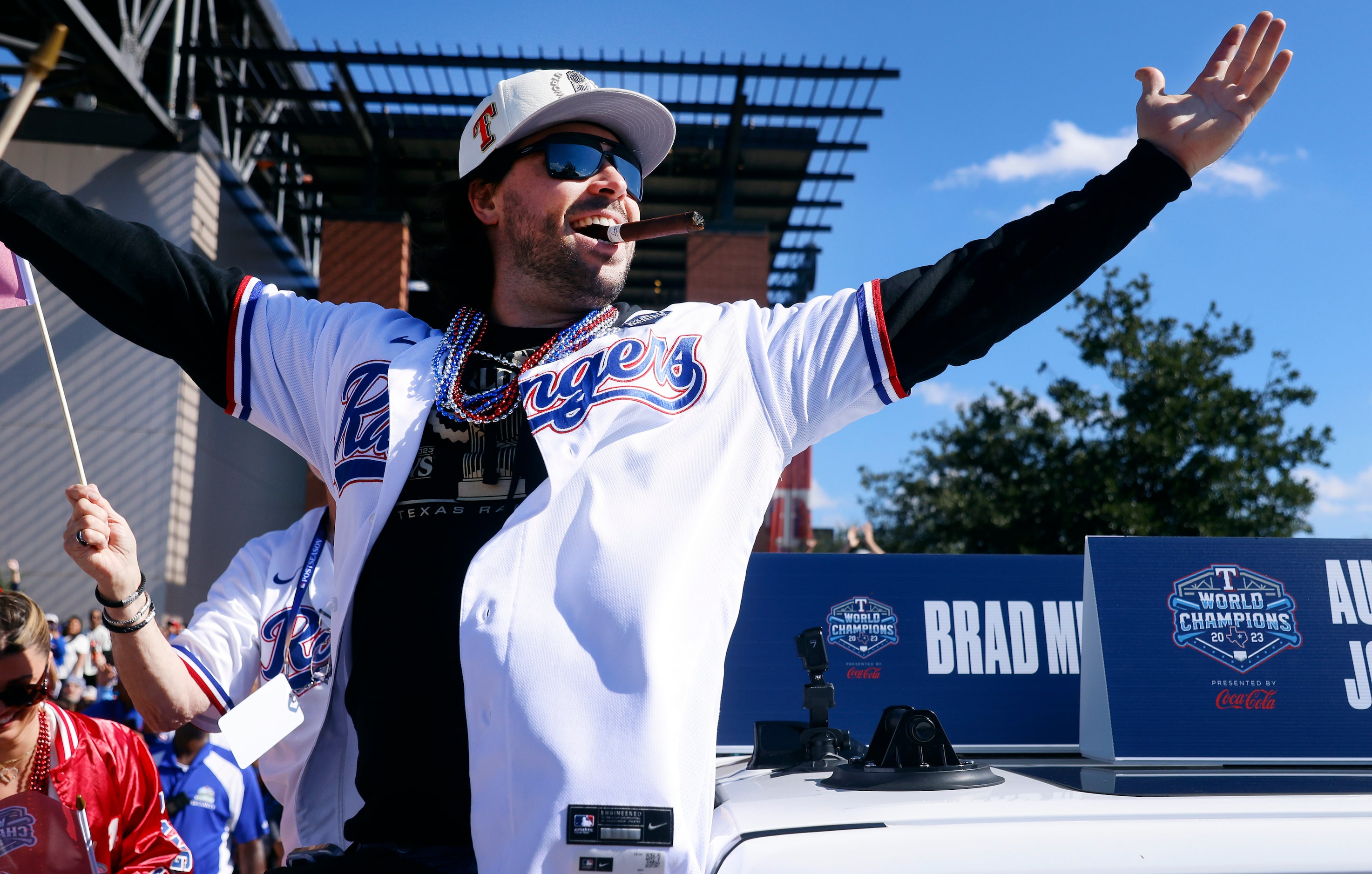 Texas Rangers catcher Austin Hedges celebrates with friends during the World Series Victory...