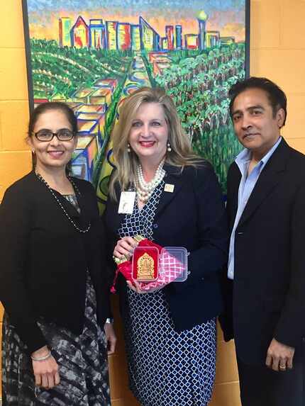 From left: Aradhana Asava, North Texas Food Bank CEO Trish Cunningham and Raj G. Asava. 