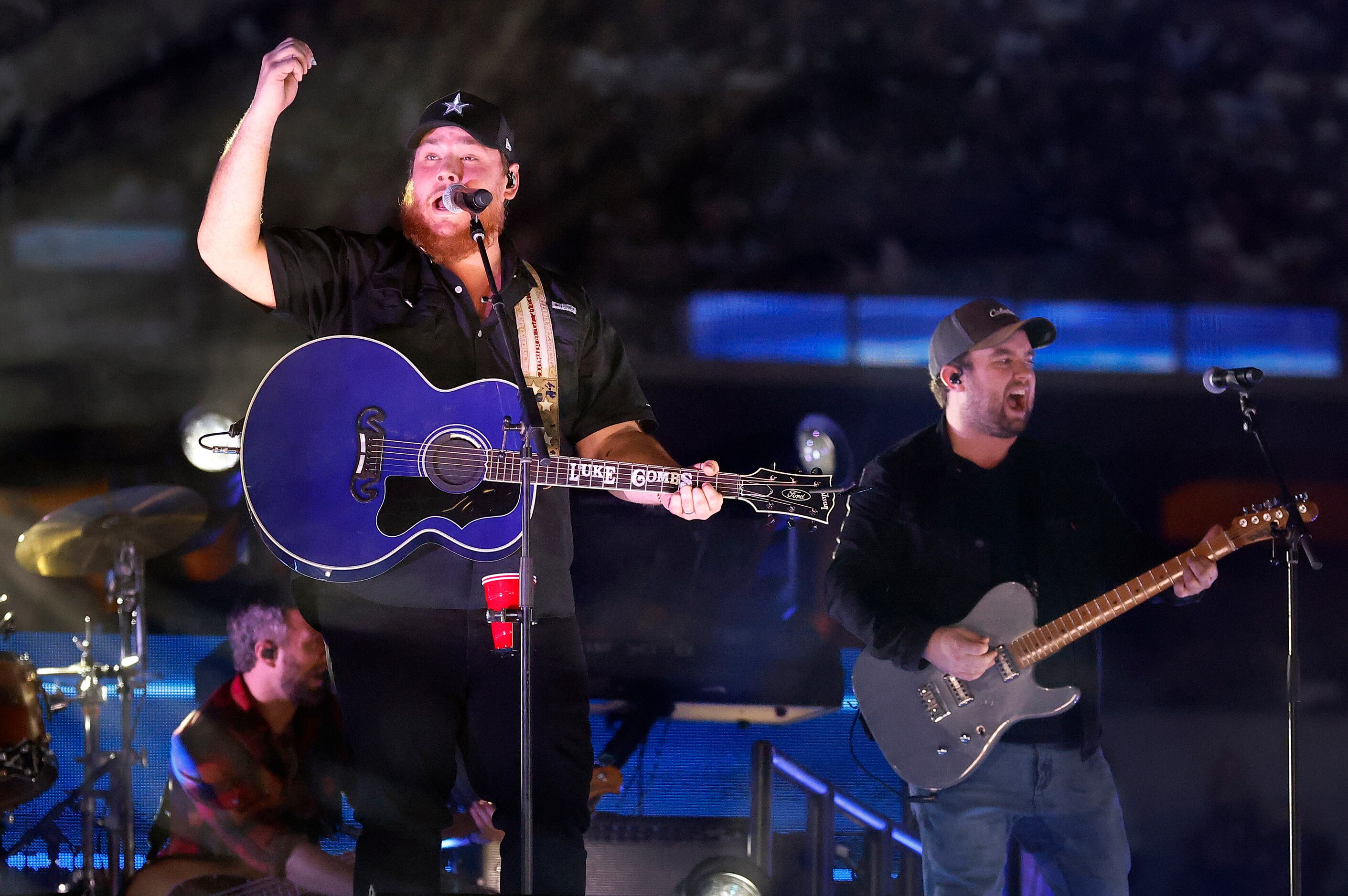 Country artist Luke Combs performs during the halftime show at AT&T Stadium in Arlington,...