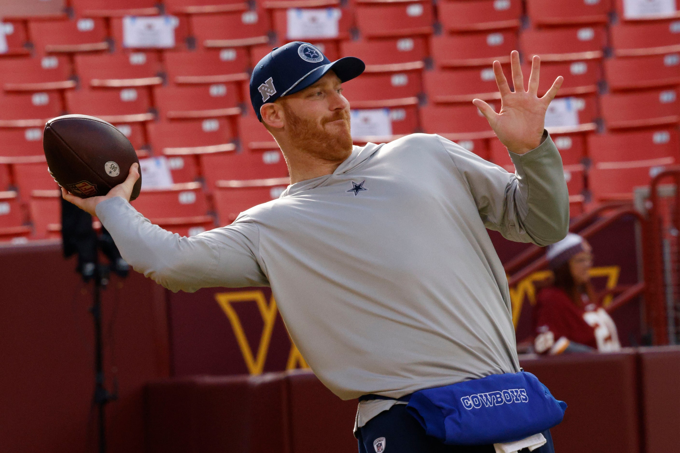 Dallas Cowboys quarterback Cooper Rush (10) warms up before an NFL football game against the...