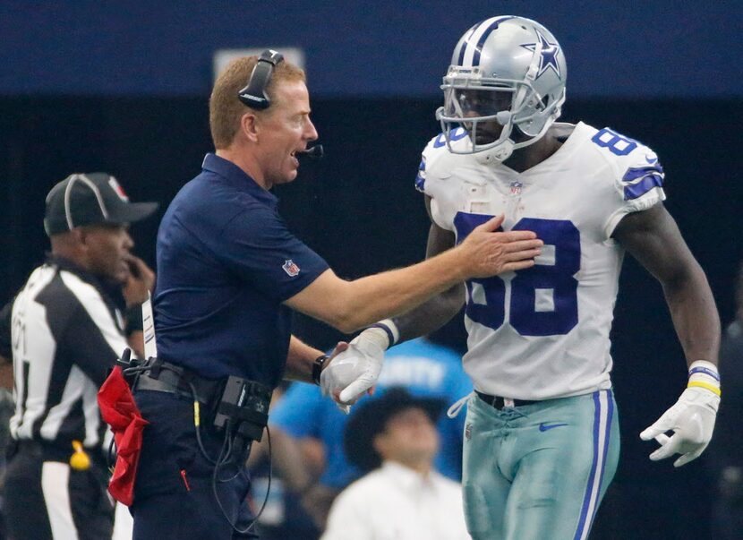 Dallas head coach Jason Garrett congratulates Dez Bryant (88) after a Dallas score during...