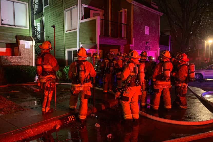 Dallas firefighters put out a four-alarm fire at a condo complex in the 9800 block of Walnut...