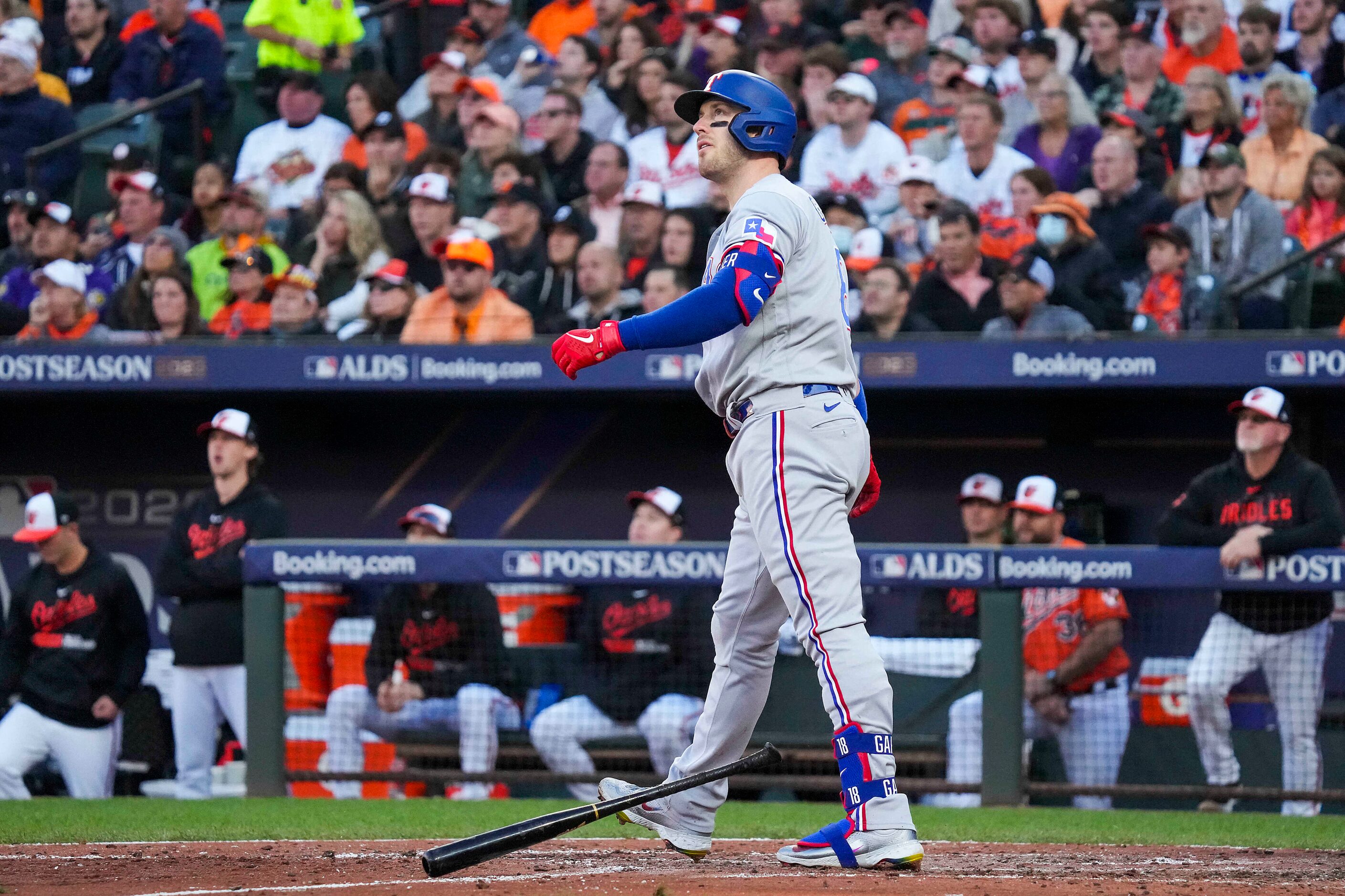 Texas Rangers designated hitter Mitch Garver watches his grand slam during the third inning ...