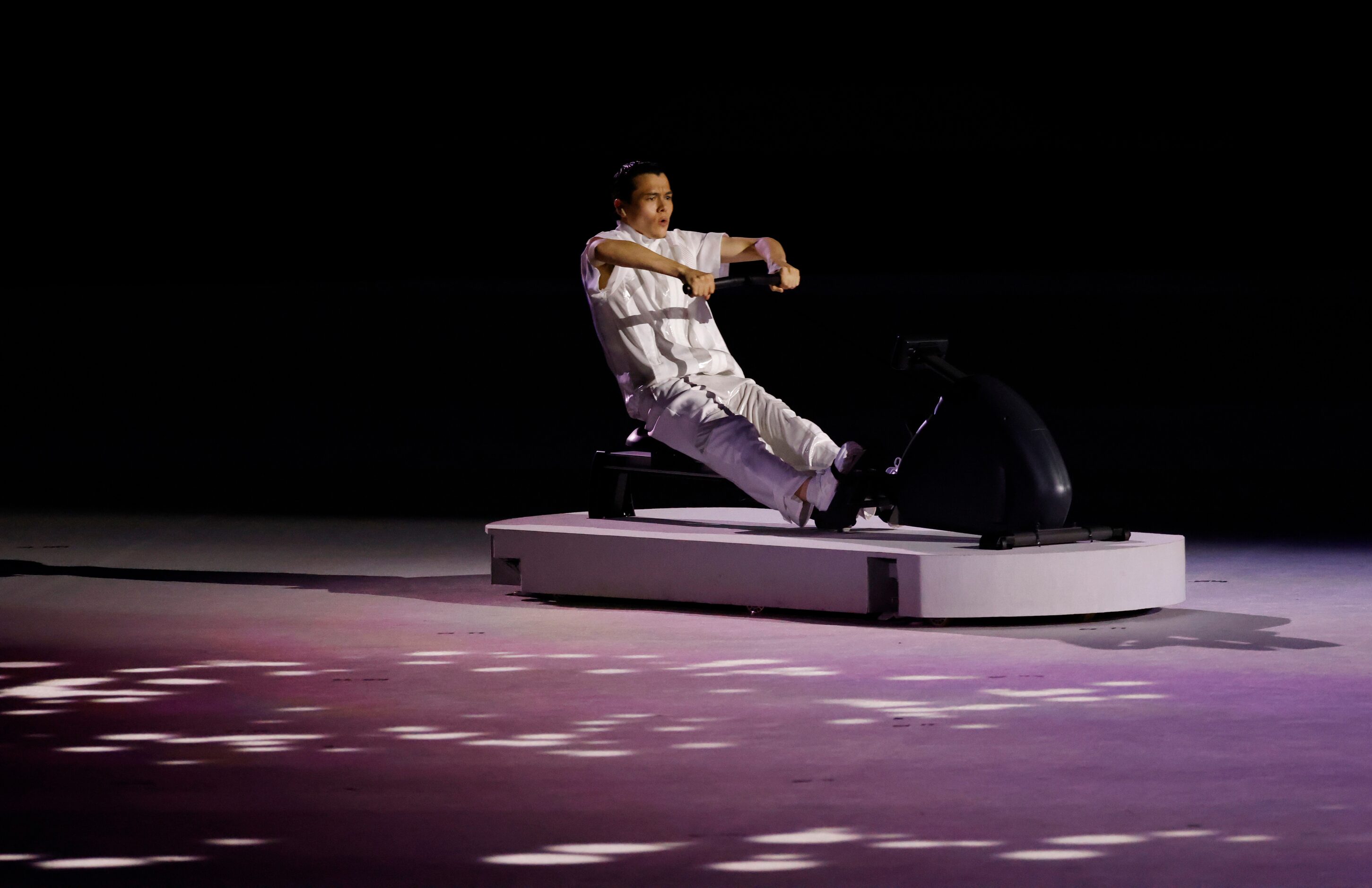 An entertainer performs during the opening ceremony for the postponed 2020 Tokyo Olympics at...