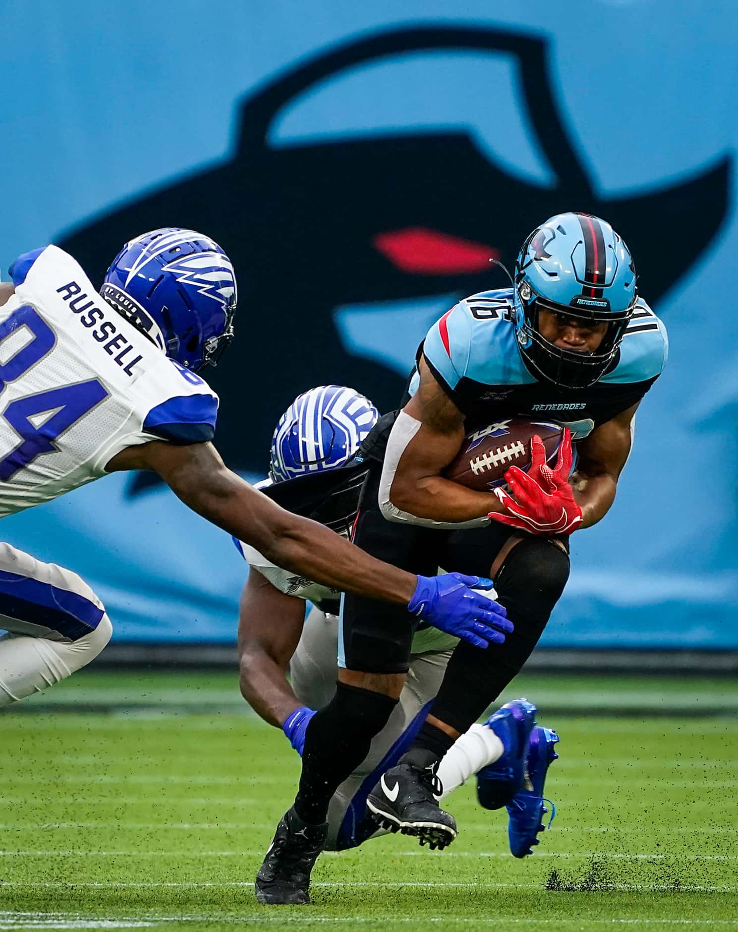 Dallas Renegades wide receiver Jerrod Heard (16) is brought down by the St. Louis...