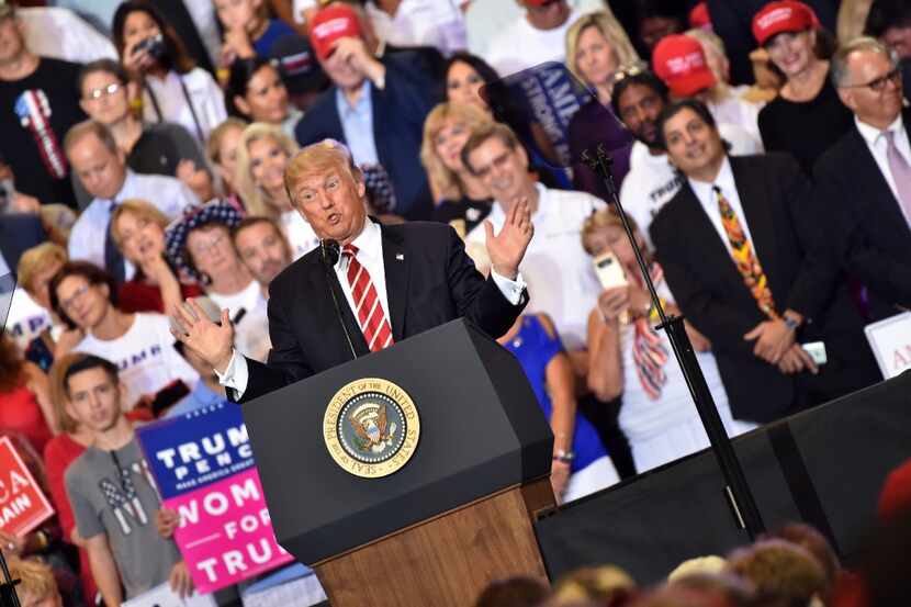 U.S. President Donald Trump speaks at a "Make America Great Again" rally Tuesday in Phoenix.