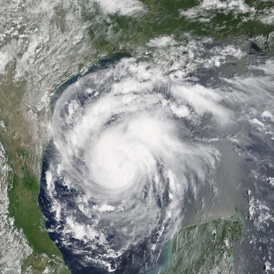 This satellite image provided by NASA on Thursday, Aug. 24, 2017 shows Hurricane Harvey off...