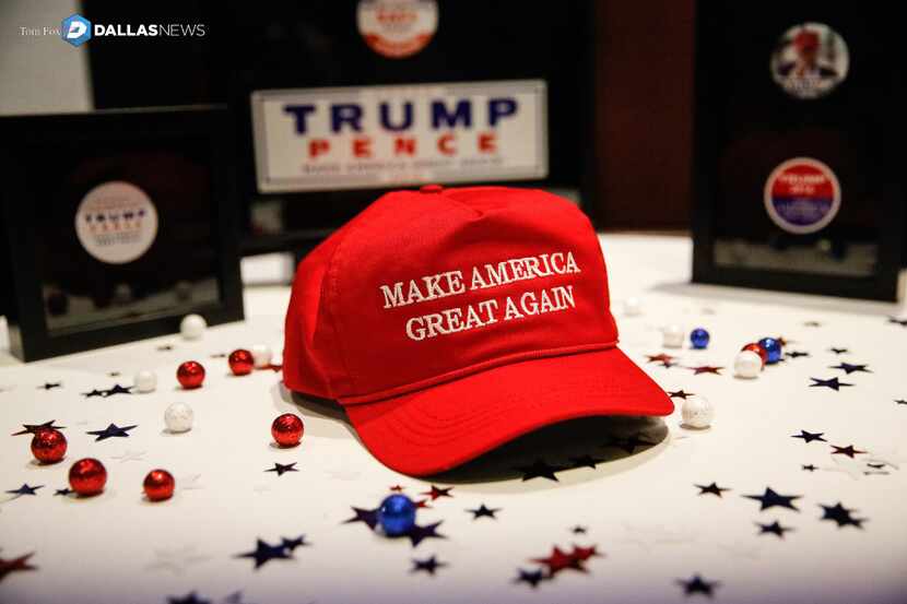 Donald Trump's signature hat, Make America Great Again, is pictured on a table at an...