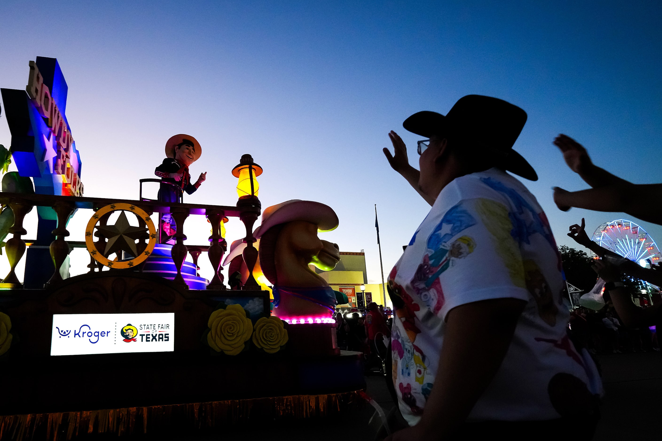 Little Big Tex waves from a float in the Starlight Parade at the State Fair of Texas on...