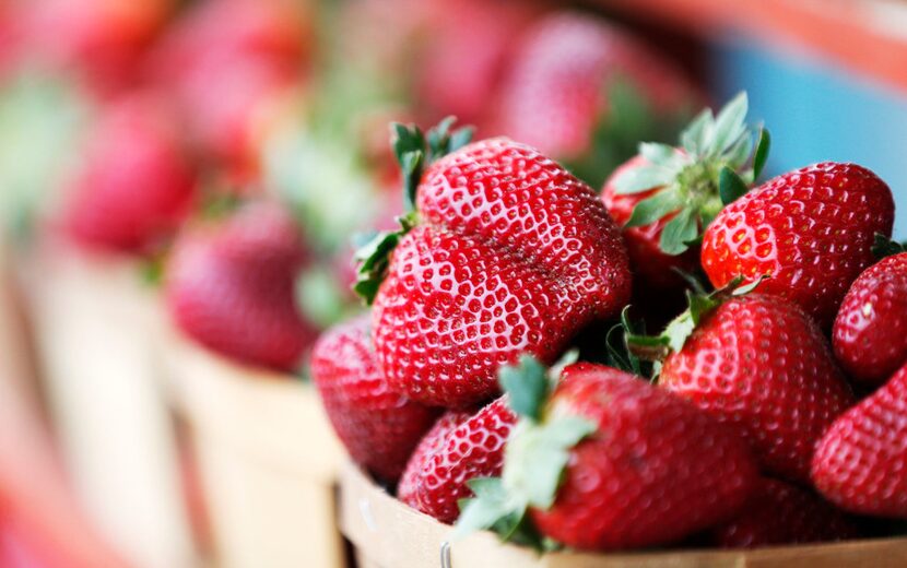 Strawberries from Highway 19 Produce & Berries on display at a Good Local market.